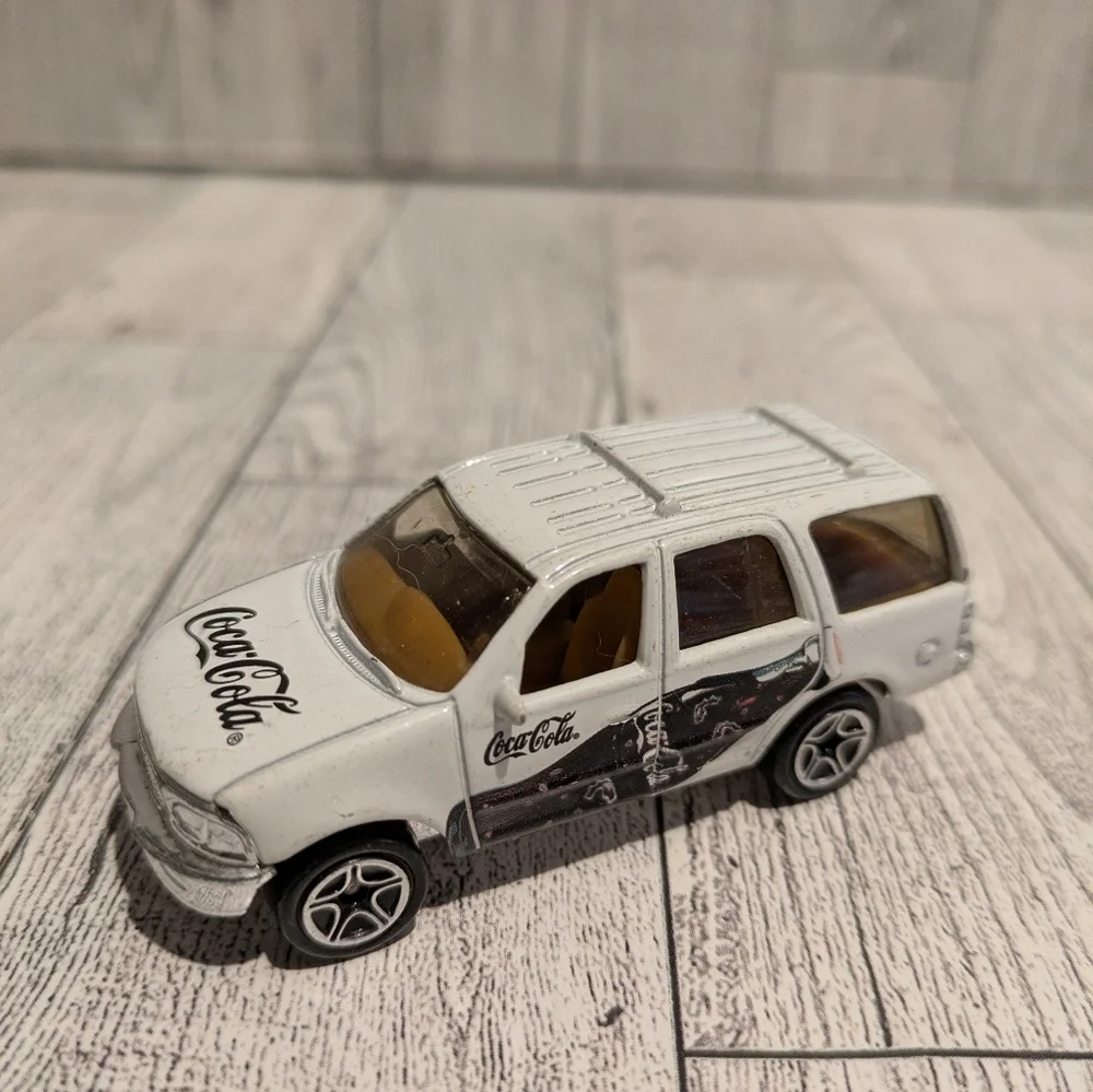 Coca Cola White Die-Cast SUV Toy with Black Graphics